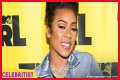 Keyshia Cole sends retro vibes in colorful, skimpy two-piece with a big afro wig in new photos